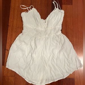 White airy romper from Francesca’s